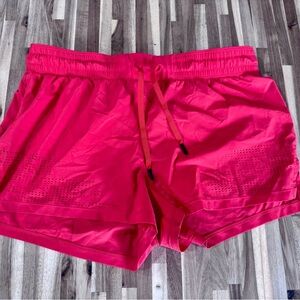Women's UA Orange Athletic Shorts